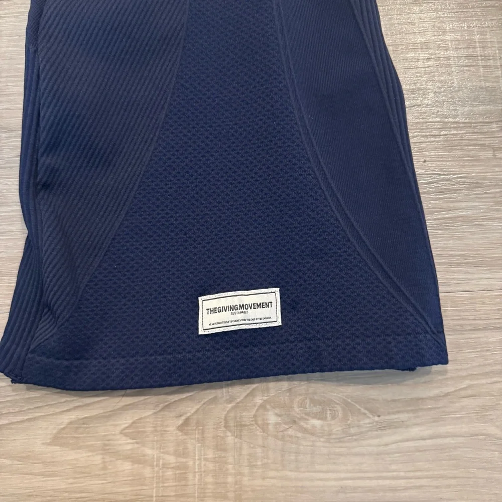 The Giving Movement Ribbed Flared Leggings in Navy - Picture 6 of 7